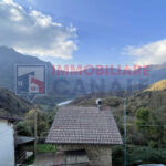 Porzione Centrale di Casa a Schiera da Ristrutturare nel Cuore di Posina