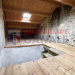 Porzione Centrale di Casa a Schiera da Ristrutturare nel Cuore di Posina