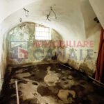Porzione Centrale di Casa a Schiera da Ristrutturare nel Cuore di Posina