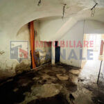 Porzione Centrale di Casa a Schiera da Ristrutturare nel Cuore di Posina